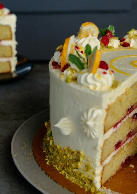 Lemon, Raspberry & Pistachio Layer Cake